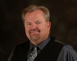 roger-reed-headshot_51b722a18fcfd1c6d43183dd9177309b